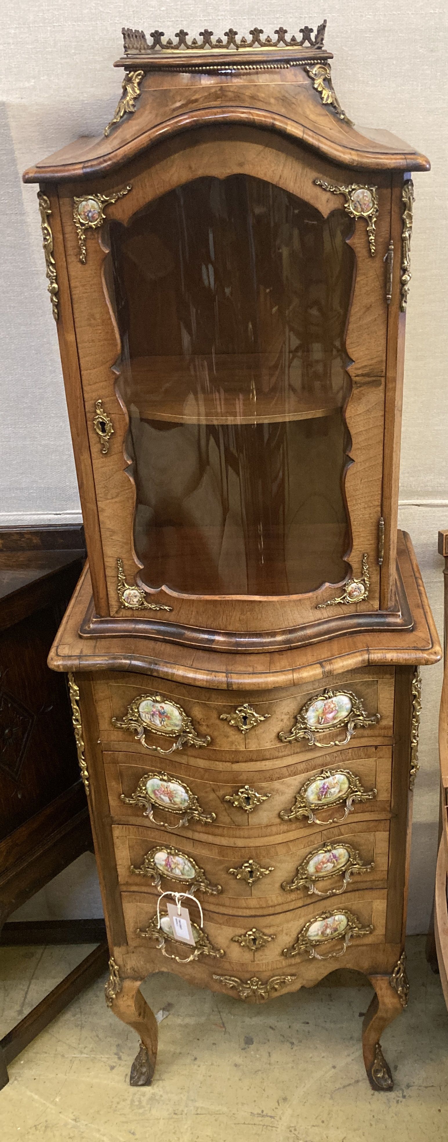 A small Louis XV style kingwood and walnut serpentine vitrine on commode base, width 49cm, depth 40cm, height 146cm